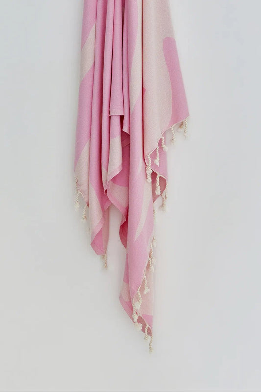 Fiori Pink Blush Turkish Beach Towel by Cove & Fold - hanging detail