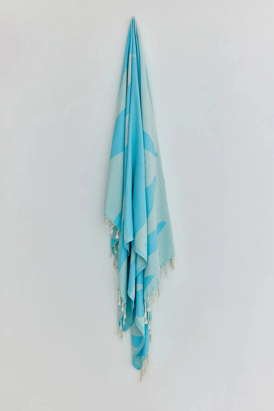 Fiori Sky Blue Turkish Beach Towel by Cove & Fold - hanging view
