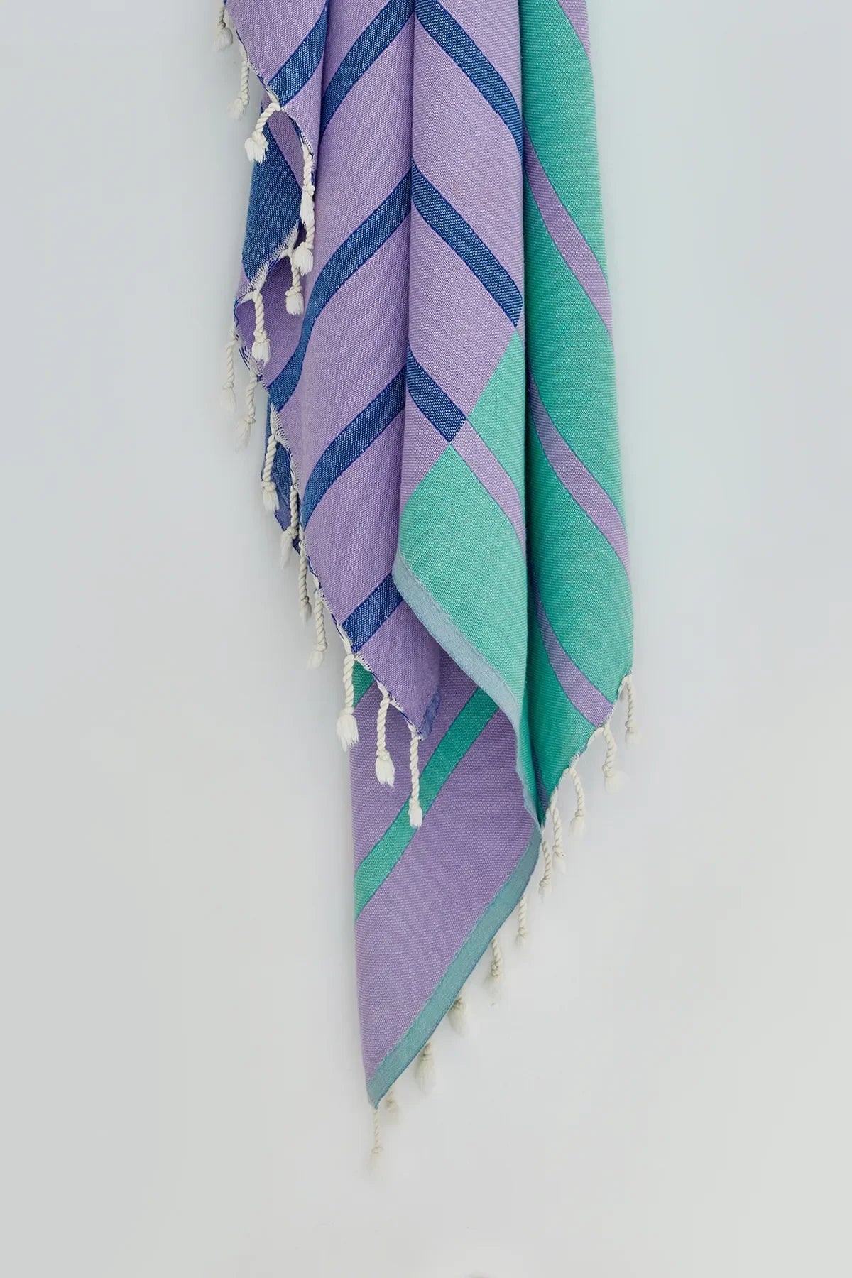 Lane Lilac Green Double-Faced Turkish Towel by Cove & Fold - hanging detail
