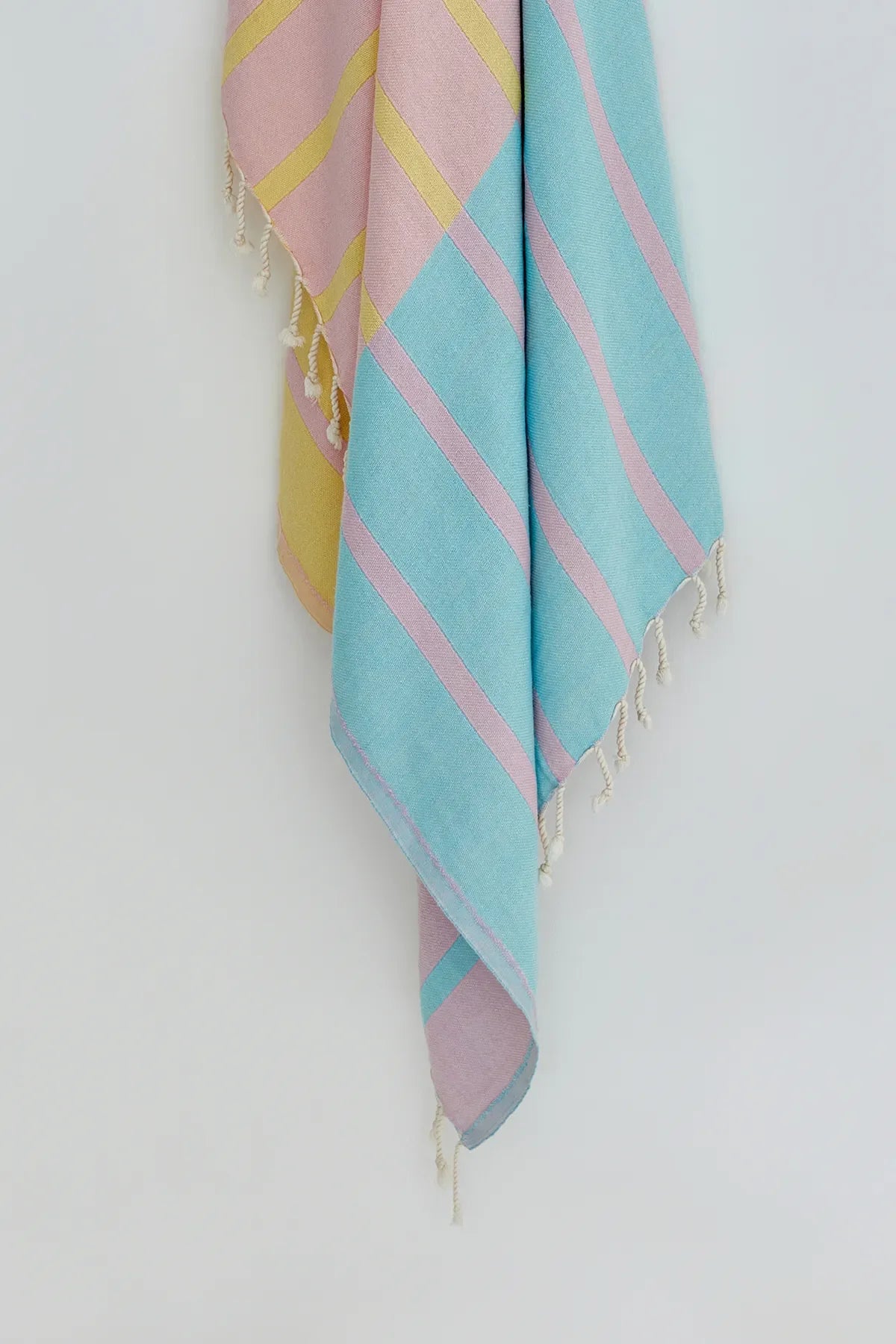 Lane Pink Blue Double-Faced Turkish Towel by Cove & Fold - hanging detail