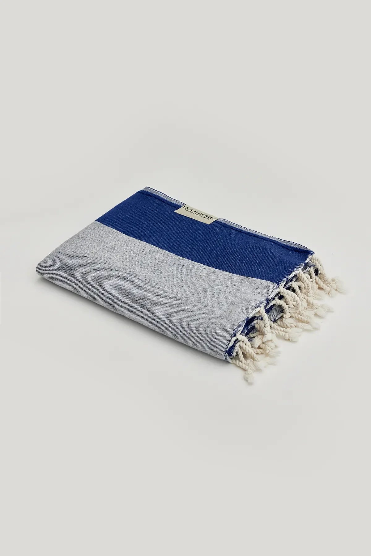 La Luna Indigo Turkish Beach Towel by Cove & Fold - folded view