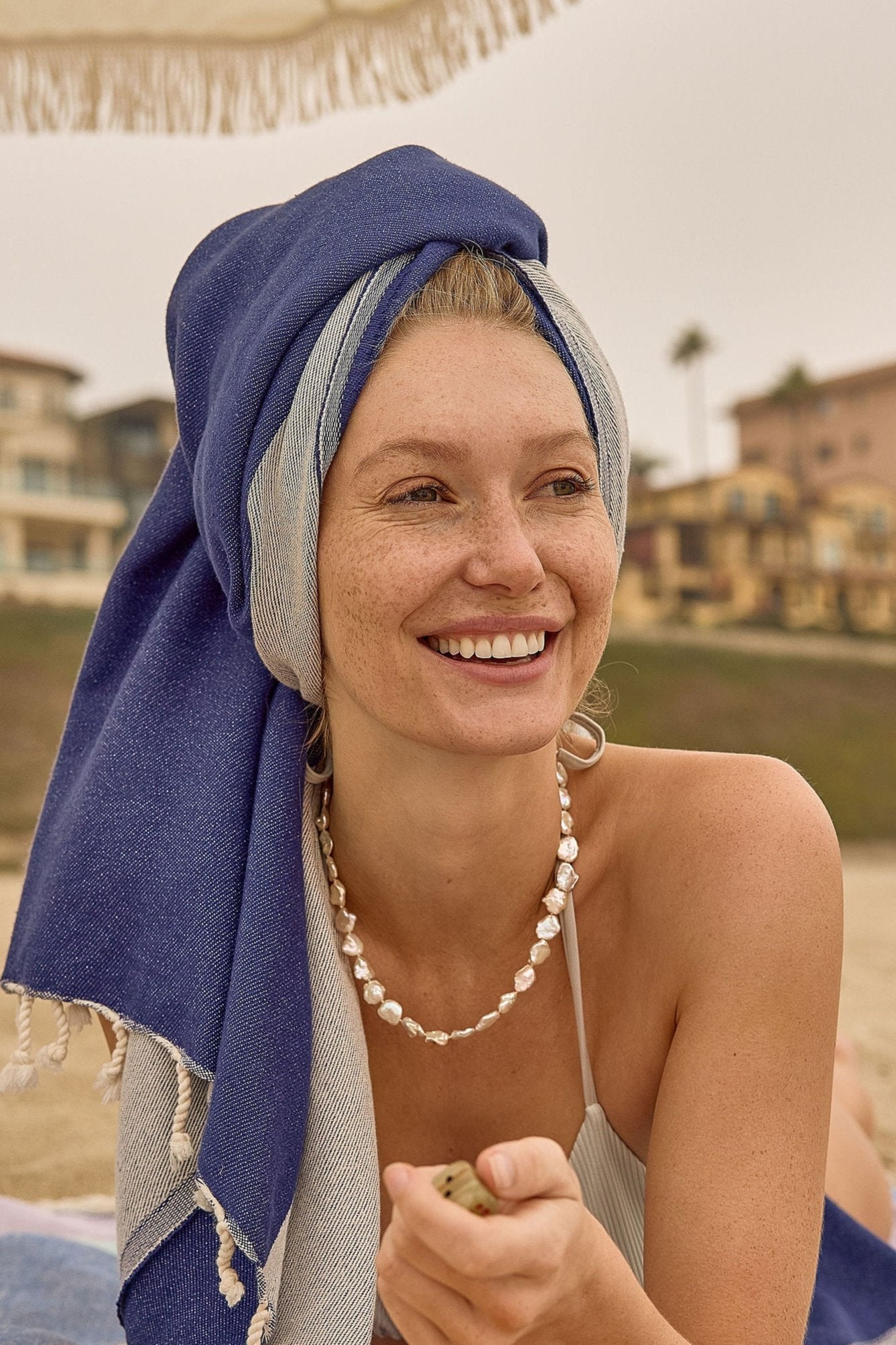 La Luna Indigo Turkish Beach Towel by Cove & Fold - lifestyle view