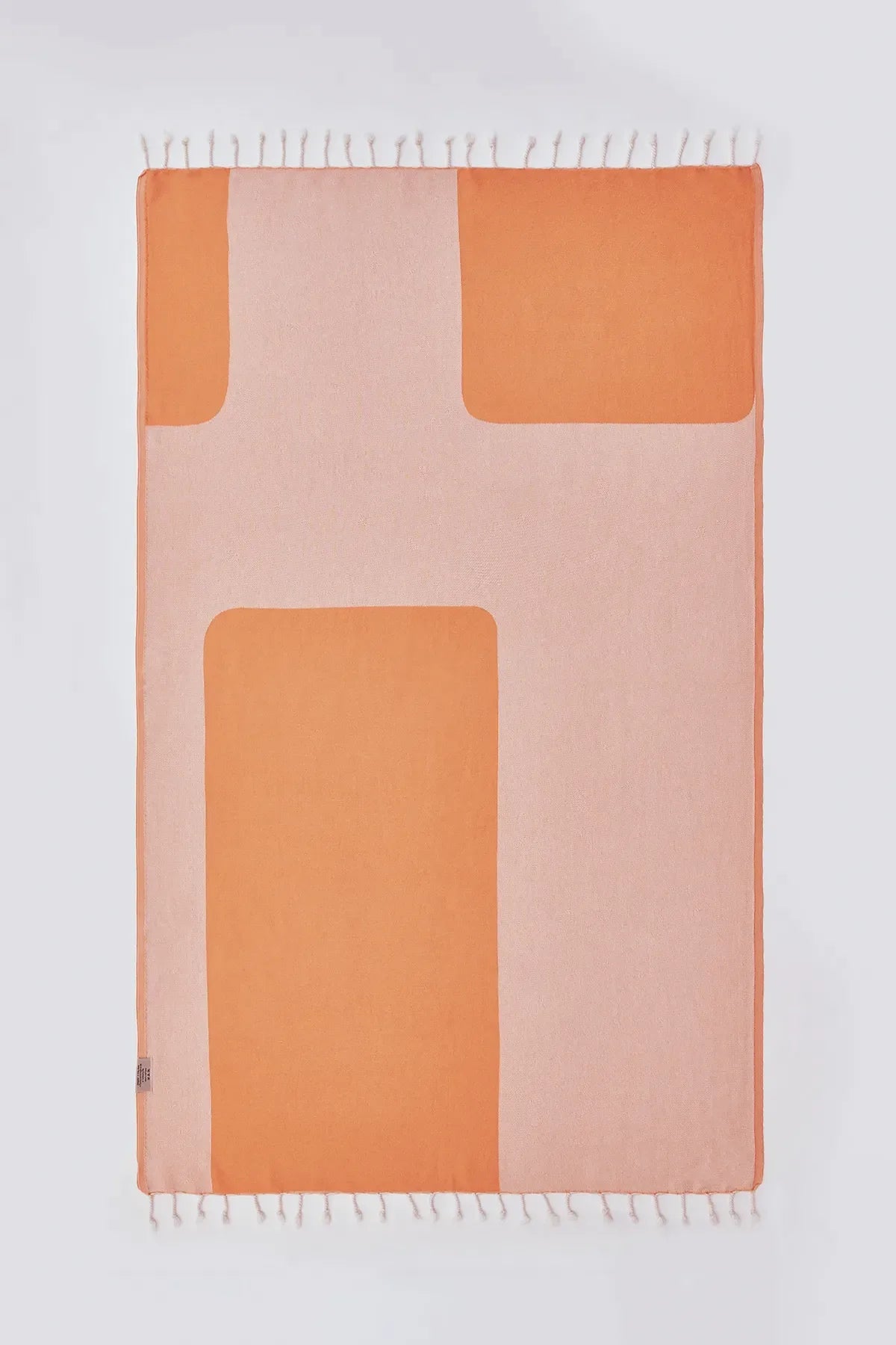 La Luna Peach Turkish Beach Towel by Cove & Fold - back view