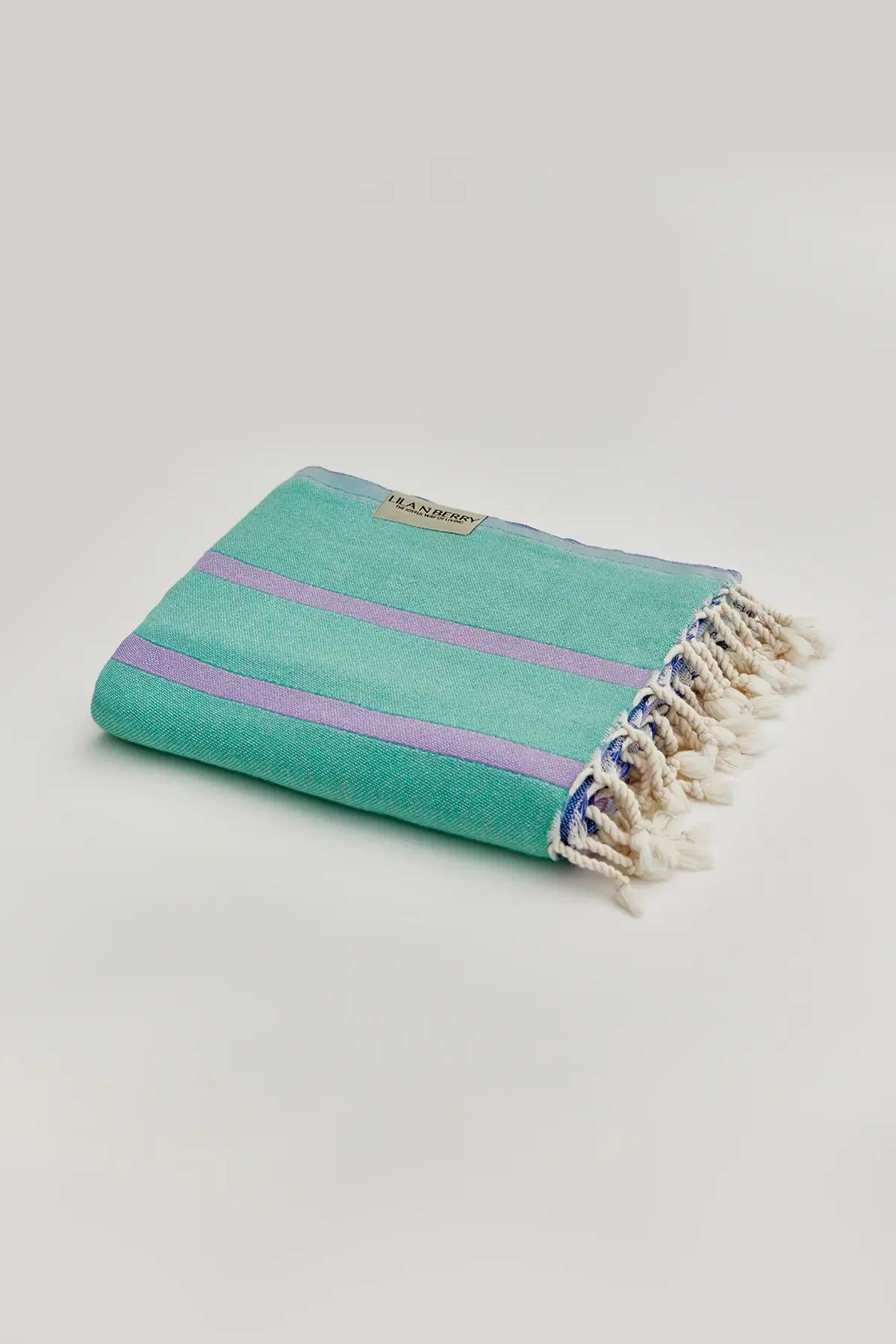 Lane Lilac Green Double-Faced Turkish Towel by Cove & Fold - folded view