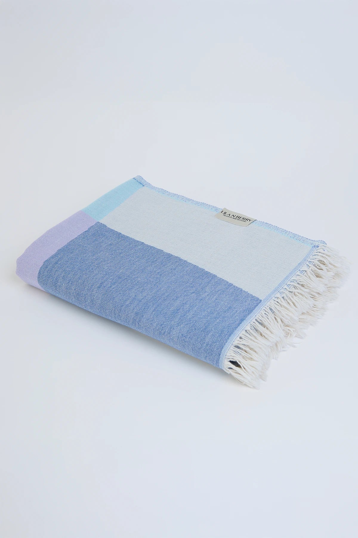 Pale Pluie Mellow Indigo XL Turkish Towel by Cove & Fold - folded view