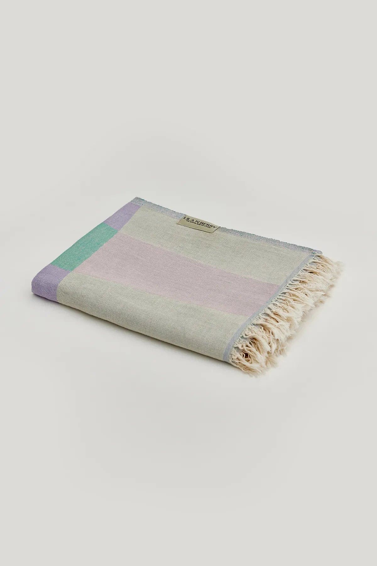 Pale Pluie Mellow Green Dobby Turkish Towel by Cove & Fold - folded view
