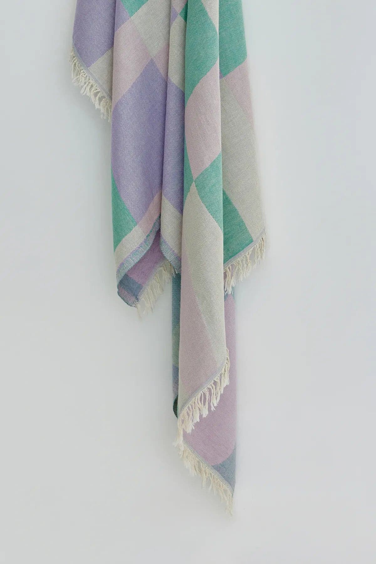 Pale Pluie Mellow Green Dobby Turkish Towel by Cove & Fold - hanging detail