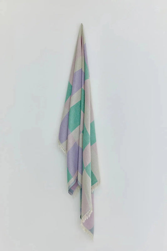 Pale Pluie Mellow Green Dobby Turkish Towel by Cove & Fold - hanging view