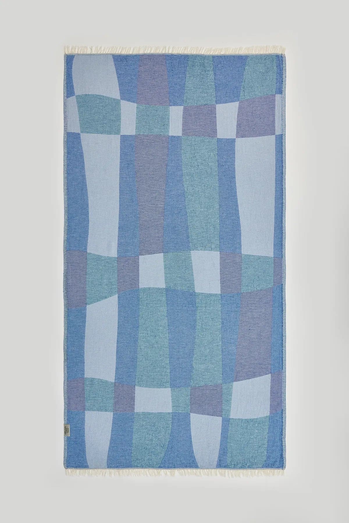 Pale Pluie Mellow Indigo Dobby Turkish Towel by Cove & Fold - back view