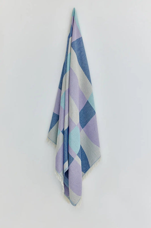 Pale Pluie Mellow Indigo Dobby Turkish Towel by Cove & Fold - hanging view