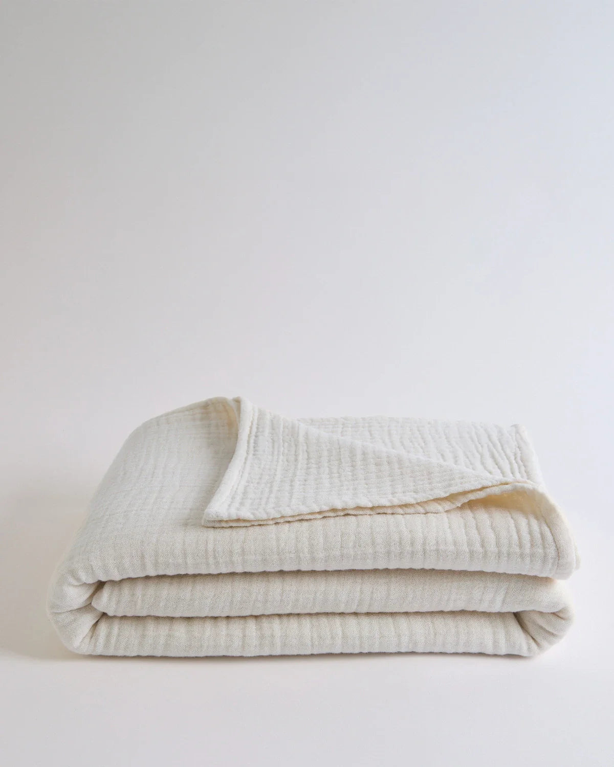 Natural Lightweight Gauze Summer Blanket by Cove & Fold - folded view