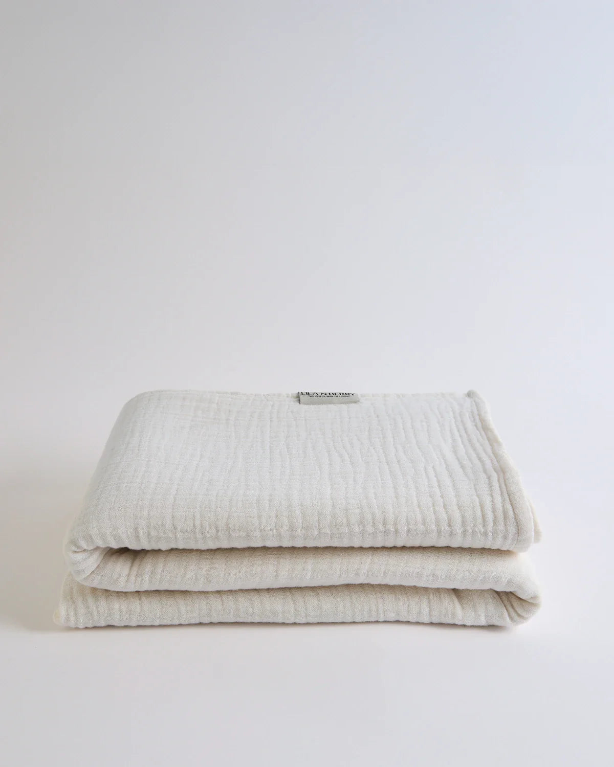 Natural Lightweight Gauze Summer Blanket by Cove & Fold - folded view